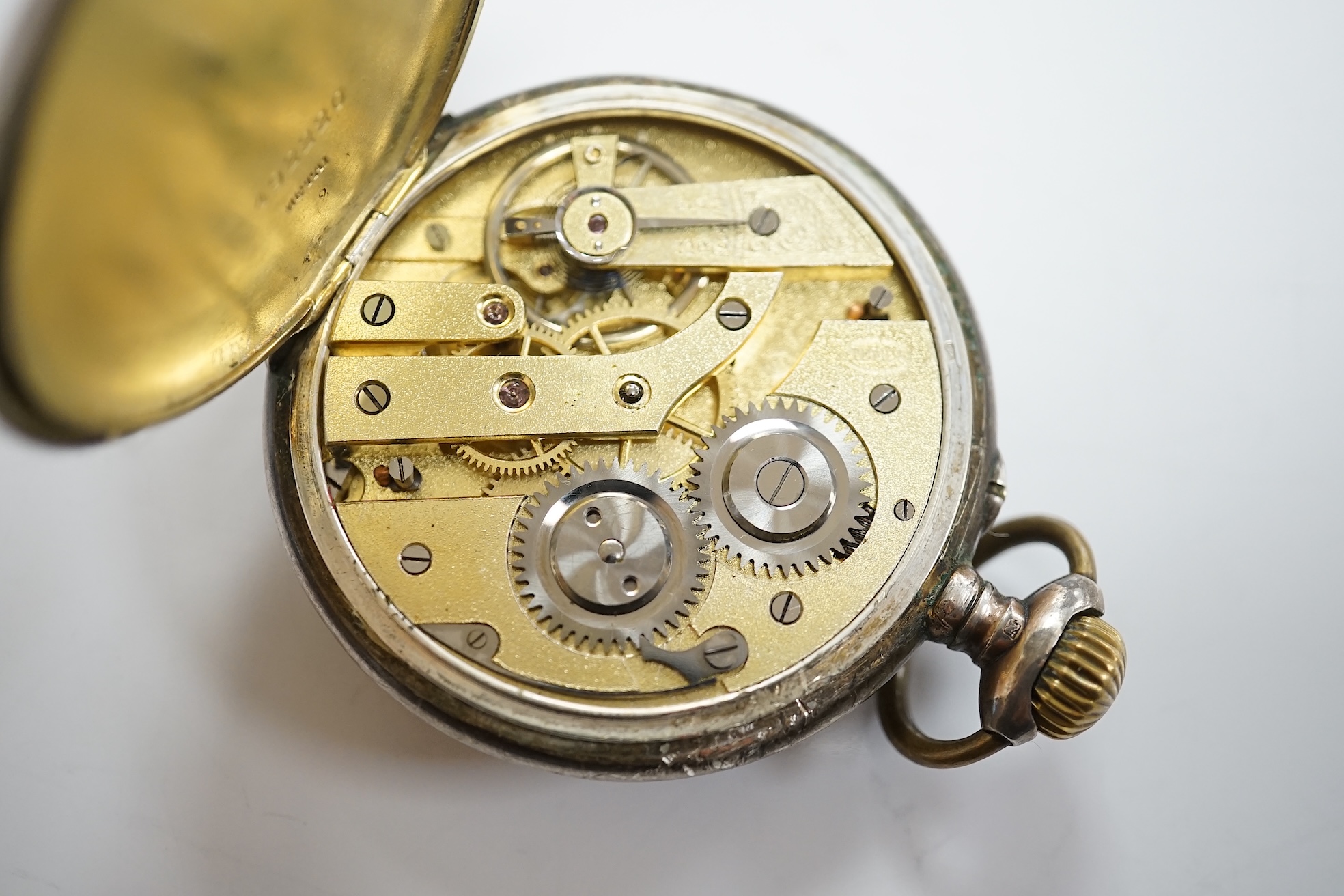 A gentleman's steel and gold plated Omega manual wind wrist watch, no strap, case diameter 35mm, together with a lady's silver wrist watch and a pocket watch. Condition - varies